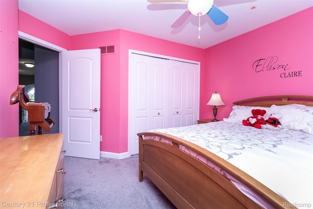 23640 Woodside Ct, South Lyon, MI 48178 - bedroom with light carpet, a closet, and ceiling fan