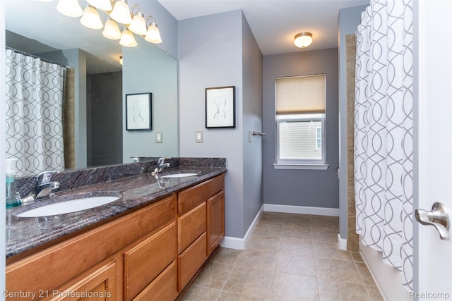 23640 Woodside Ct, South Lyon, MI 48178 - bathroom featuring double vanity, tile patterned floors, and a shower with curtain