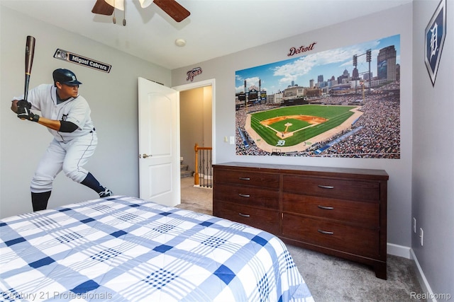 23640 Woodside Ct, South Lyon, MI 48178 - bedroom with light colored carpet and ceiling fan