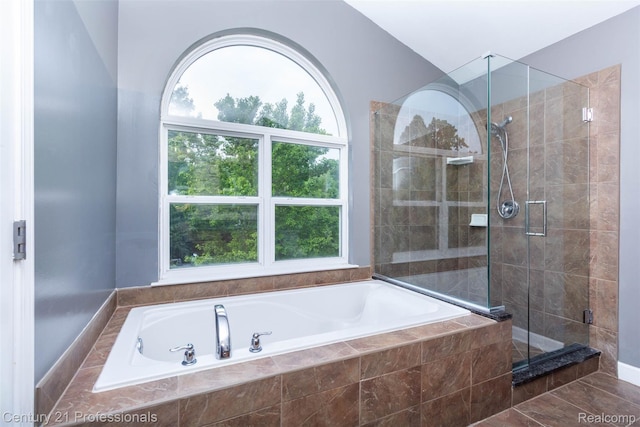 23640 Woodside Ct, South Lyon, MI 48178 - bathroom featuring a bath and a stall shower