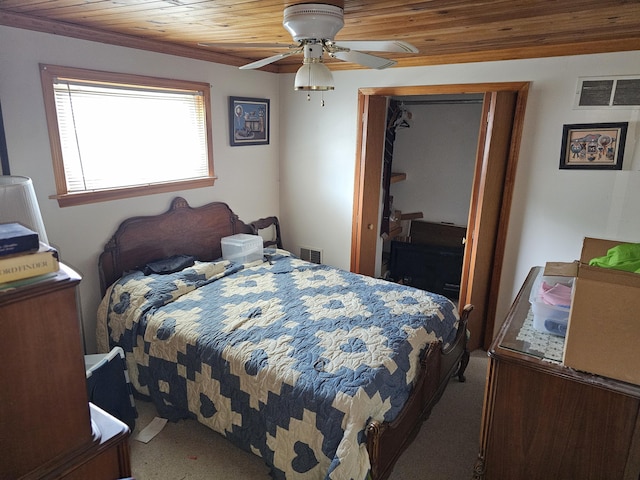 83140 Waldron Dr, Lawton, MI 49065 - carpeted bedroom featuring wood ceiling, a closet, and ceiling fan