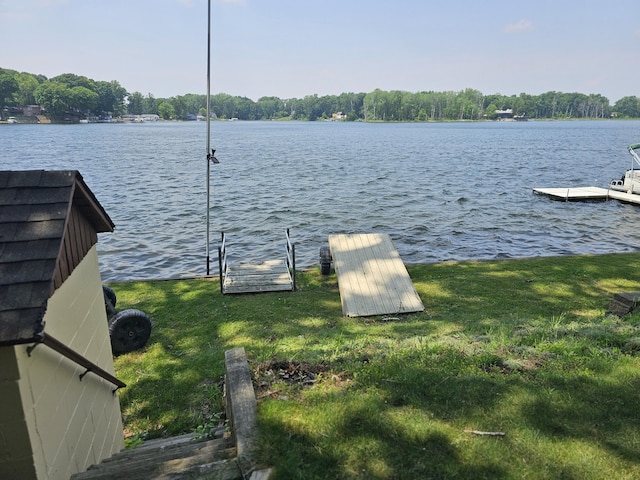 83140 Waldron Dr, Lawton, MI 49065 - dock featuring a water view and a lawn
