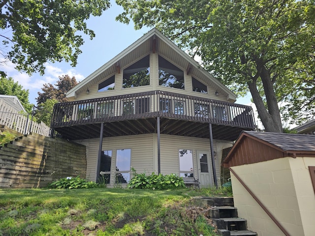 83140 Waldron Dr, Lawton, MI 49065 - back of property with a deck and an outbuilding