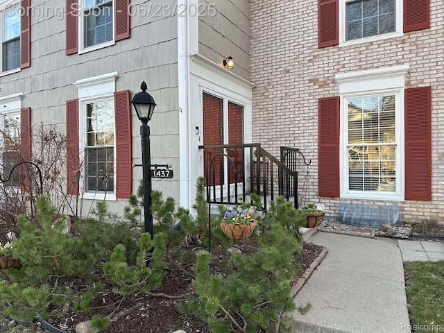 1437 Lantern Ln, Rochester Hills, MI 48306 - view of exterior entry featuring brick siding
