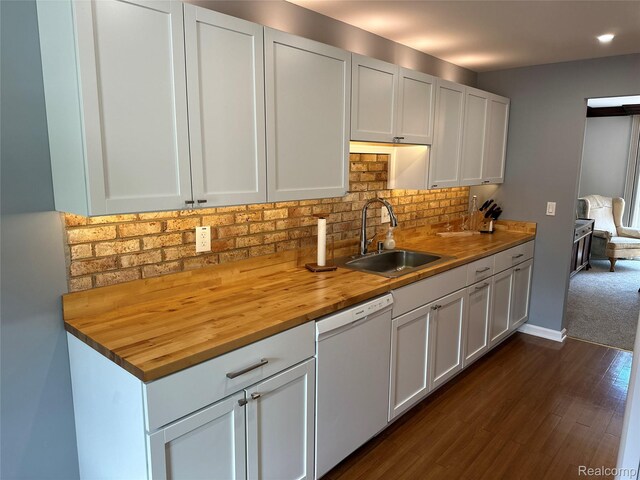 1437 Lantern Ln, Rochester Hills, MI 48306 - kitchen featuring dishwasher, butcher block countertops, dark wood-style floors, tasteful backsplash, and white cabinetry