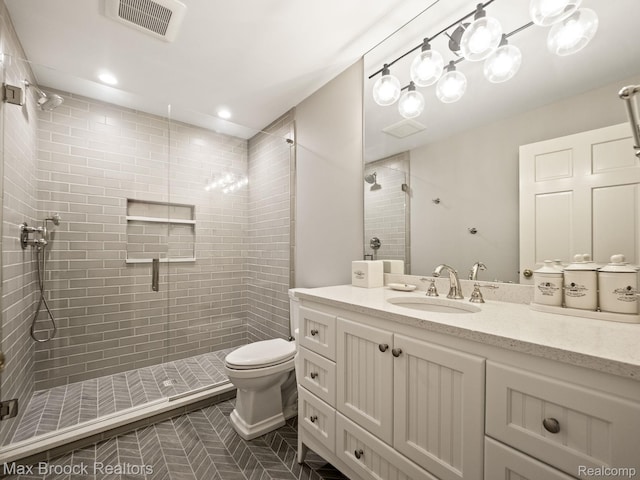 full bathroom featuring a shower stall, vanity, tile patterned flooring, and recessed lighting