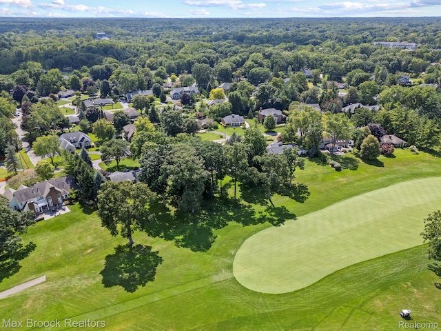 aerial perspective of suburban area with a golf course