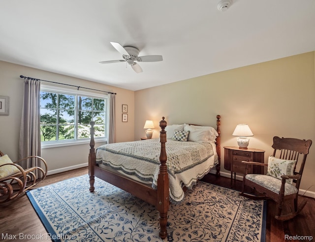bedroom featuring wood finished floors and ceiling fan