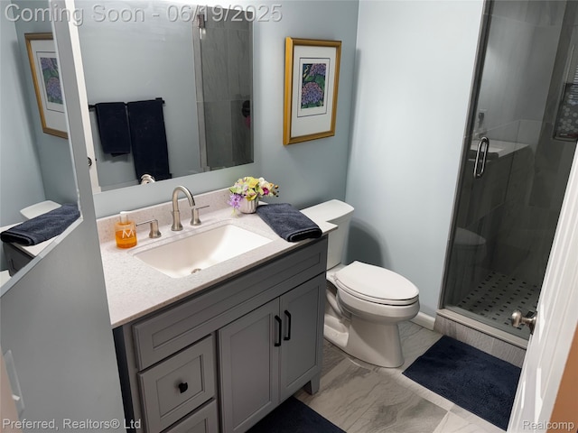 22208 Pondview, Novi, MI 48375 - bathroom featuring vanity, a stall shower, and marble finish floors