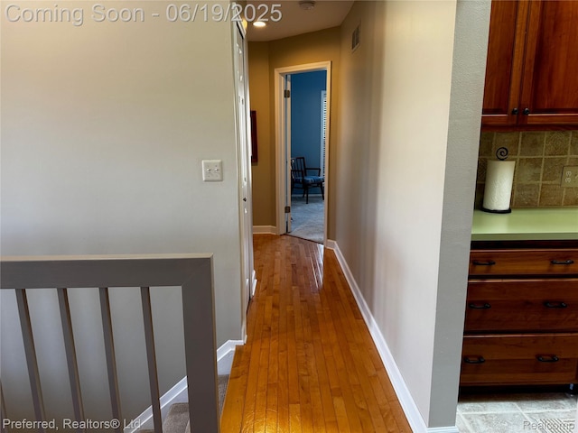 22208 Pondview, Novi, MI 48375 - hall featuring light wood-type flooring and baseboards