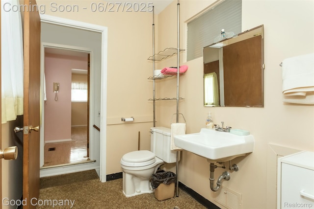 29035 Spoon Ave, Waterford, MI 48071 - half bathroom with toilet and baseboards