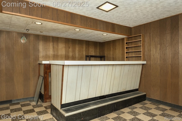 29035 Spoon Ave, Waterford, MI 48071 - bar area featuring tile patterned floors and wood walls