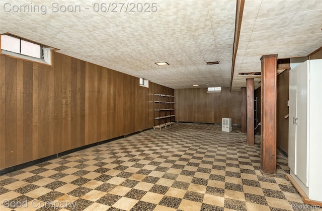 29035 Spoon Ave, Waterford, MI 48071 - below grade area featuring wood walls and tile patterned floors