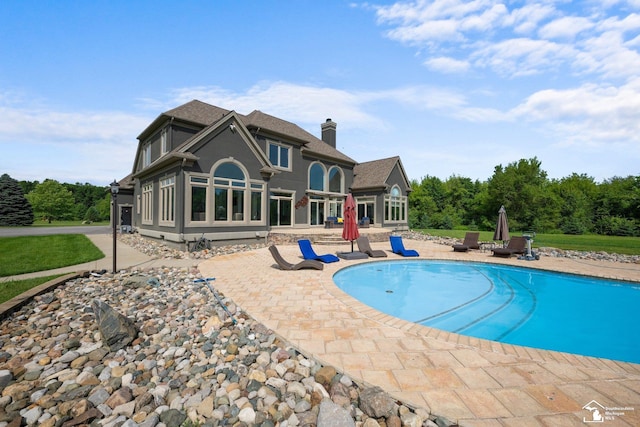 11694 Robinshire St, Temperance, MI 48182 - swimming pool with a patio