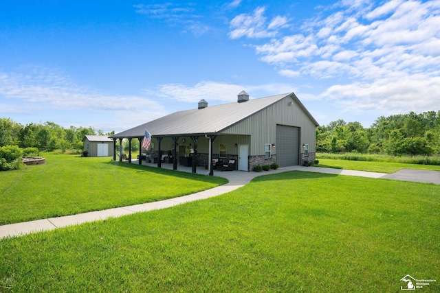 11694 Robinshire St, Temperance, MI 48182 - exterior space featuring a lawn, driveway, a metal roof, and a garage