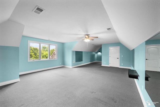 11694 Robinshire St, Temperance, MI 48182 - additional living space with lofted ceiling, carpet flooring, and ceiling fan