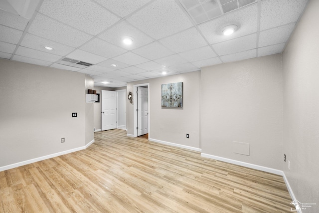 11694 Robinshire St, Temperance, MI 48182 - empty room with light wood-style floors, a paneled ceiling, and recessed lighting
