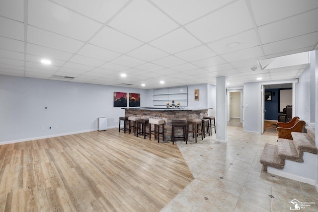 11694 Robinshire St, Temperance, MI 48182 - indoor wet bar featuring a paneled ceiling, light wood-style flooring, and recessed lighting