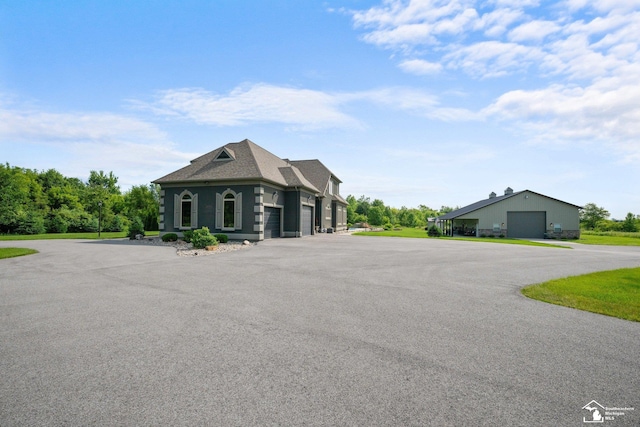 11694 Robinshire St, Temperance, MI 48182 - view of front of property featuring a garage