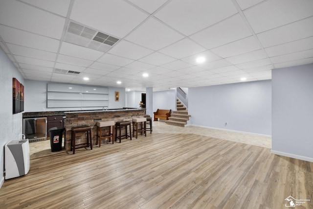 11694 Robinshire St, Temperance, MI 48182 - indoor bar with stairs, light wood-style floors, and recessed lighting