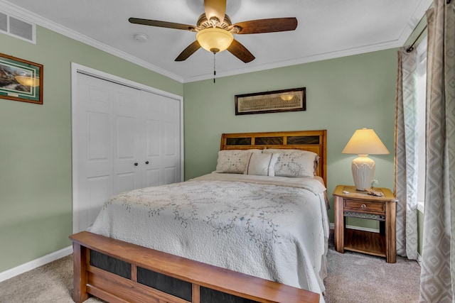 6824 Napoleon Rd, Jackson, MI 49201 - bedroom with carpet floors, crown molding, a closet, and a ceiling fan