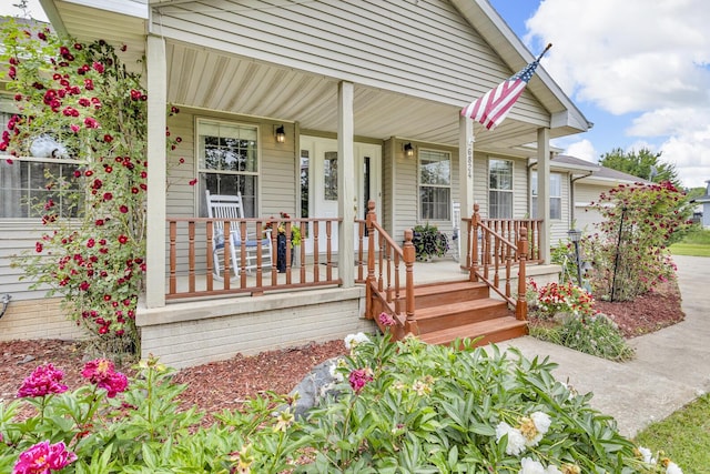6824 Napoleon Rd, Jackson, MI 49201 - entrance to property featuring a porch
