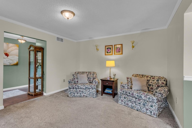 6824 Napoleon Rd, Jackson, MI 49201 - sitting room featuring ornamental molding, carpet flooring, and a textured ceiling