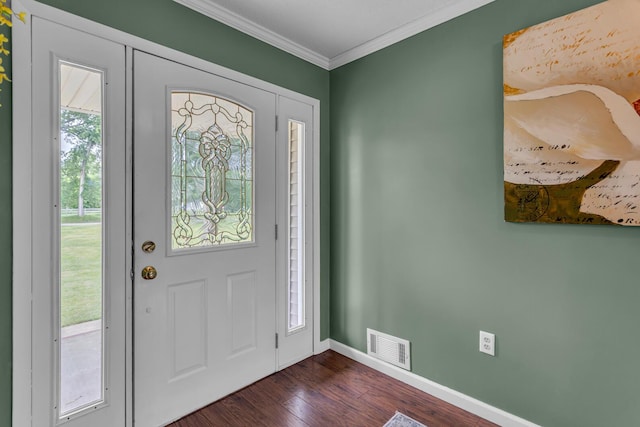 6824 Napoleon Rd, Jackson, MI 49201 - entryway with dark wood-style floors and ornamental molding