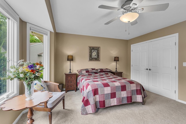 4268 Fairway Ln, Jackson, MI 49201 - carpeted bedroom featuring a closet and ceiling fan
