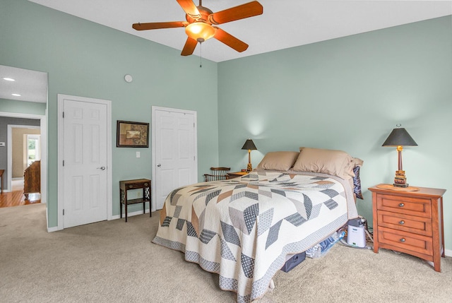 4268 Fairway Ln, Jackson, MI 49201 - bedroom with carpet, a ceiling fan, and high vaulted ceiling