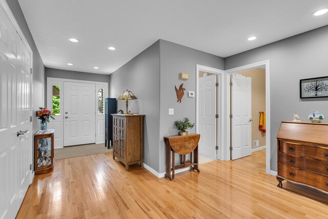 4268 Fairway Ln, Jackson, MI 49201 - foyer entrance with light wood finished floors and recessed lighting