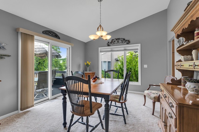 4268 Fairway Ln, Jackson, MI 49201 - dining area with light colored carpet and high vaulted ceiling