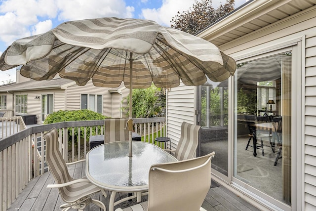 4268 Fairway Ln, Jackson, MI 49201 - wooden terrace with outdoor dining area