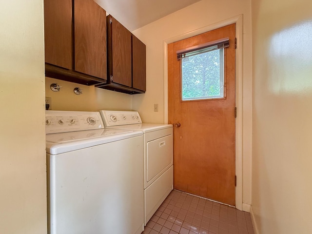 57081 M 51 S, Dowagiac, MI 49047 - laundry area with independent washer and dryer, cabinet space, and light tile patterned flooring
