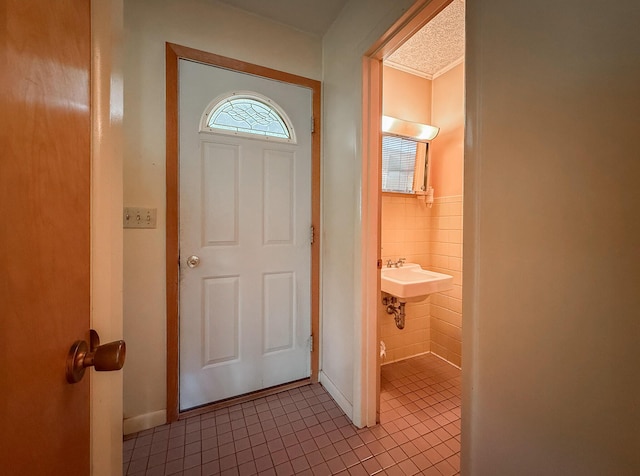 57081 M 51 S, Dowagiac, MI 49047 - foyer entrance featuring tile patterned floors and tile walls