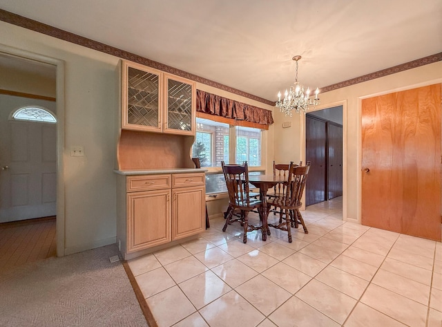 57081 M 51 S, Dowagiac, MI 49047 - dining space with a chandelier and light tile patterned floors