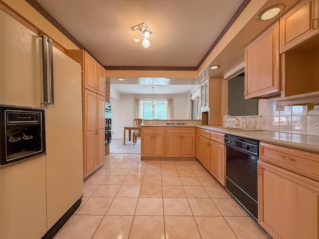 57081 M 51 S, Dowagiac, MI 49047 - kitchen featuring black appliances, light brown cabinetry, decorative backsplash, light countertops, and light tile patterned floors
