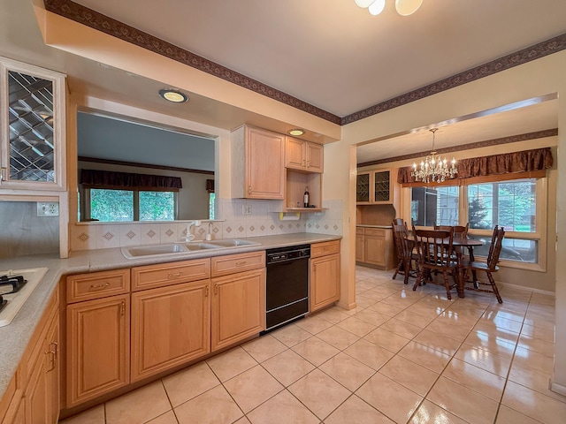 57081 M 51 S, Dowagiac, MI 49047 - kitchen with black dishwasher, a chandelier, decorative backsplash, and healthy amount of natural light
