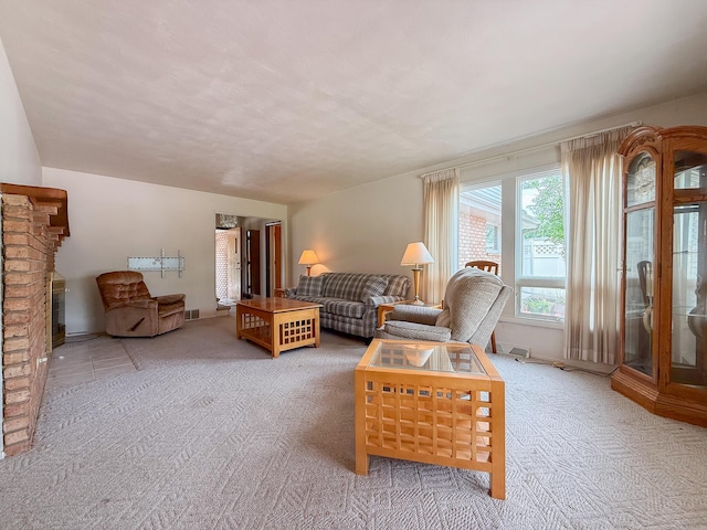 57081 M 51 S, Dowagiac, MI 49047 - living room featuring carpet floors and a brick fireplace