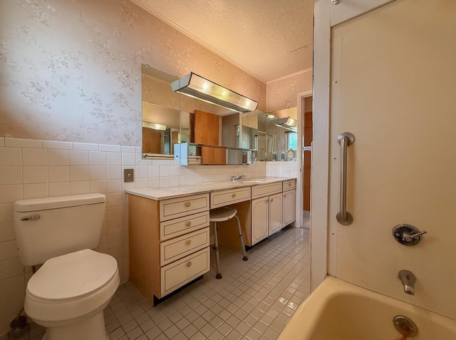 57081 M 51 S, Dowagiac, MI 49047 - bathroom with wallpapered walls, vanity, tile patterned flooring, a bath, and wainscoting