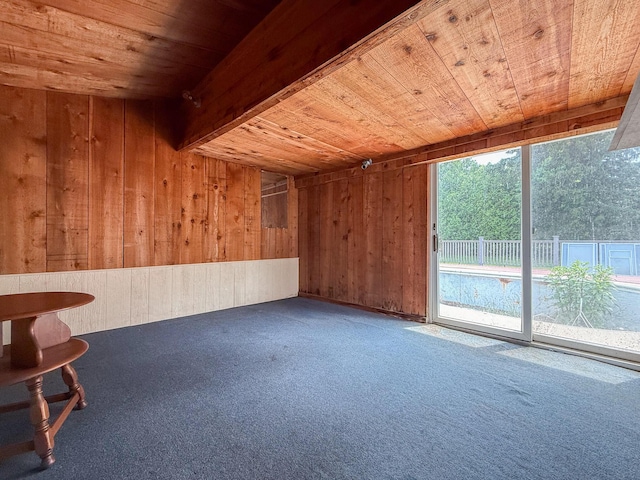 57081 M 51 S, Dowagiac, MI 49047 - empty room with wood ceiling, wooden walls, and carpet