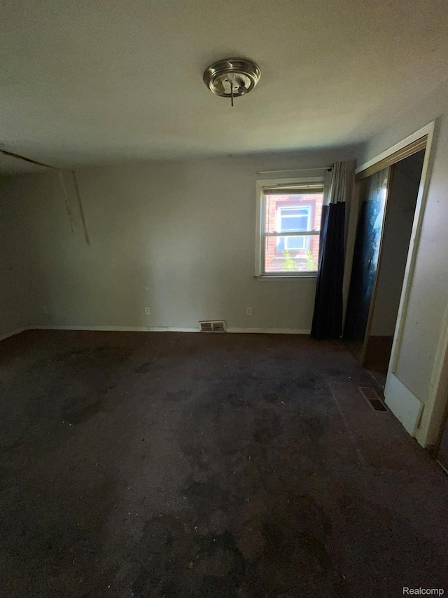 20569 Evergreen Rd, Detroit, MI 48219 - unfurnished bedroom with baseboards