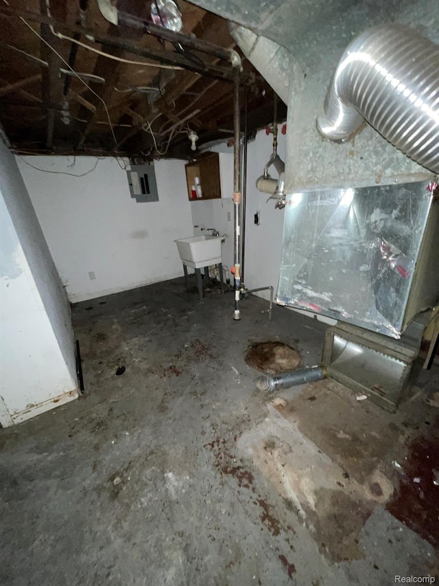 20569 Evergreen Rd, Detroit, MI 48219 - unfinished below grade area featuring electric panel and a sink