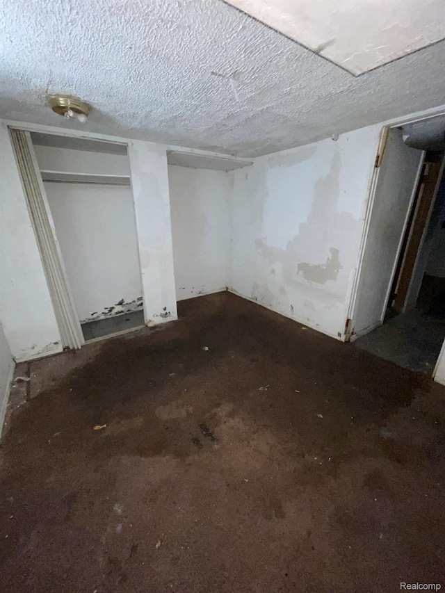 20569 Evergreen Rd, Detroit, MI 48219 - unfinished below grade area featuring a textured ceiling
