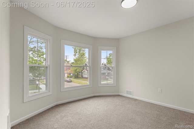 4266 Seminole St, Dearborn, MI 48214 - carpeted spare room featuring baseboards