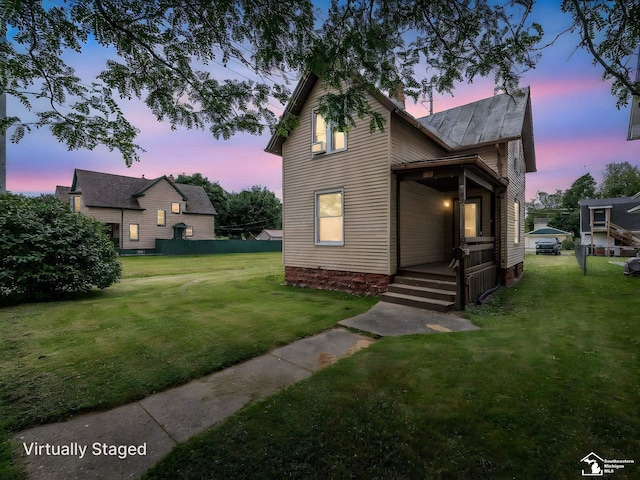 606 E 3rd St, Monroe, MI 48161 - traditional home featuring a front yard