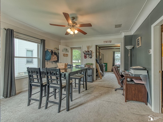 606 E 3rd St, Monroe, MI 48161 - dining space featuring light carpet, an office area, a ceiling fan, and ornamental molding