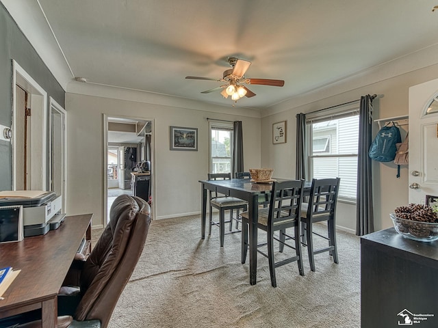 606 E 3rd St, Monroe, MI 48161 - dining space with light carpet and ceiling fan