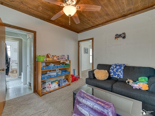 606 E 3rd St, Monroe, MI 48161 - living room featuring wooden ceiling, ceiling fan, and carpet