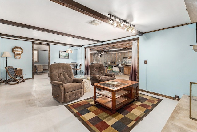 116 E Beech St, Fruitport, MI 49415 - living room with beam ceiling and finished concrete flooring
